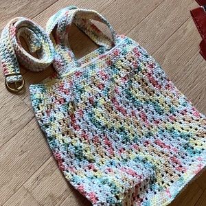 Lovely hand crafted tote bag and matching belt with goldtone buckle.